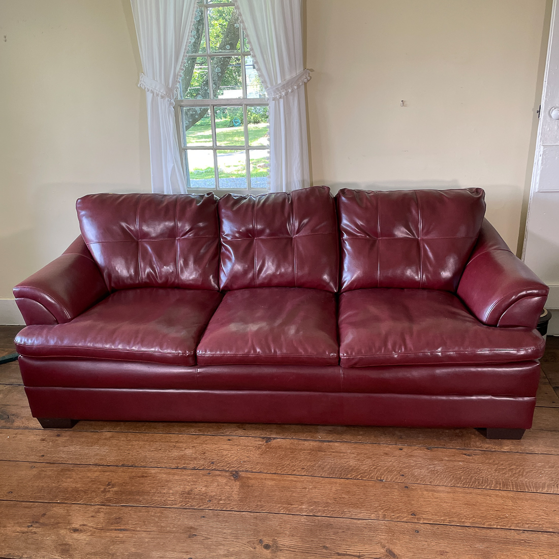 LARGE RED LEATHER SOFA