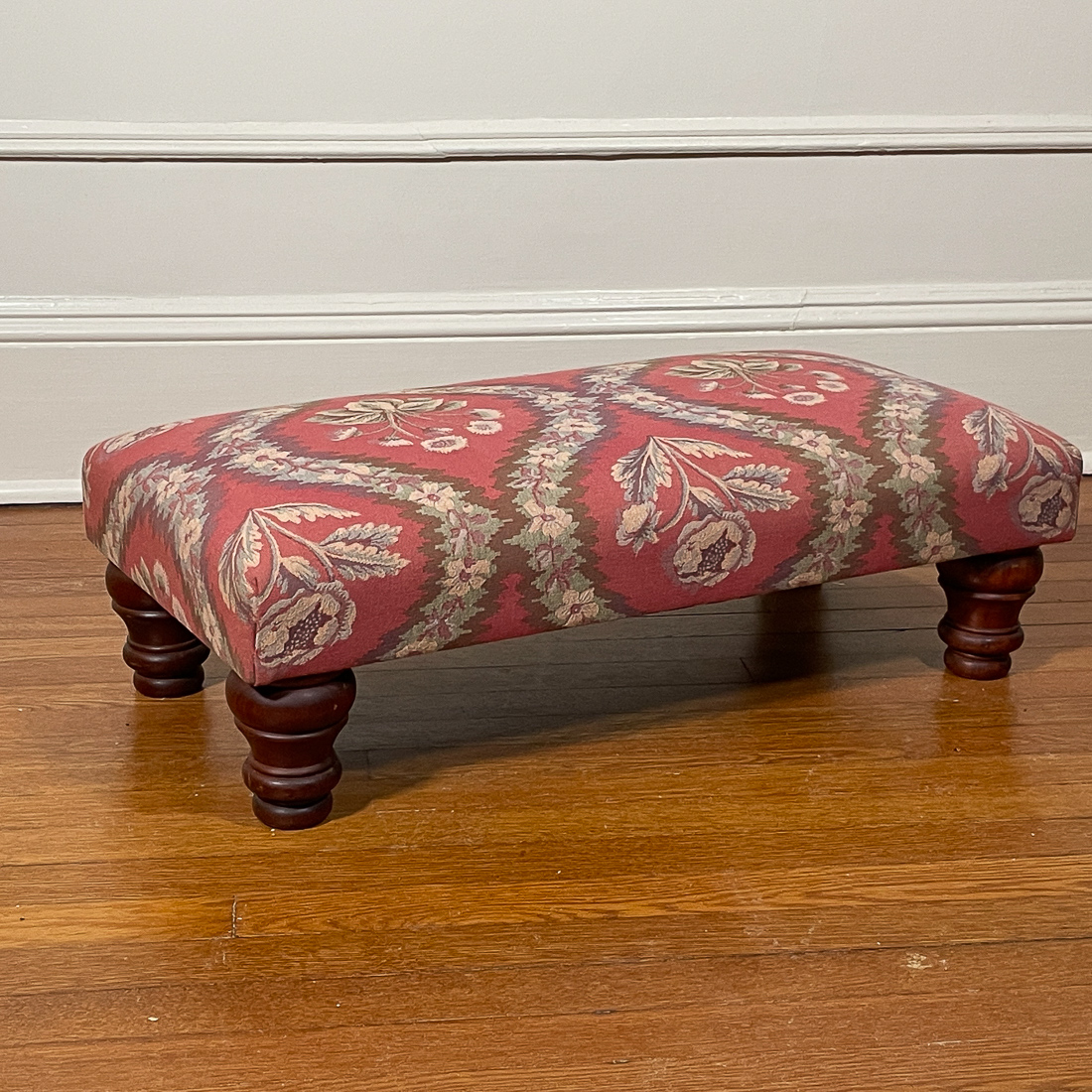UPHOLSTERED FOOTSTOOL