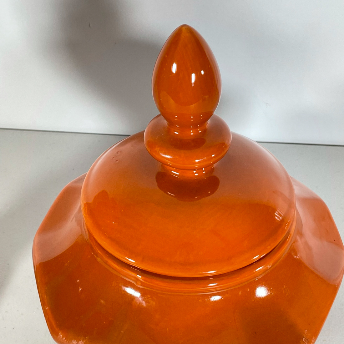 PAIR ORANGE CERAMIC JARS