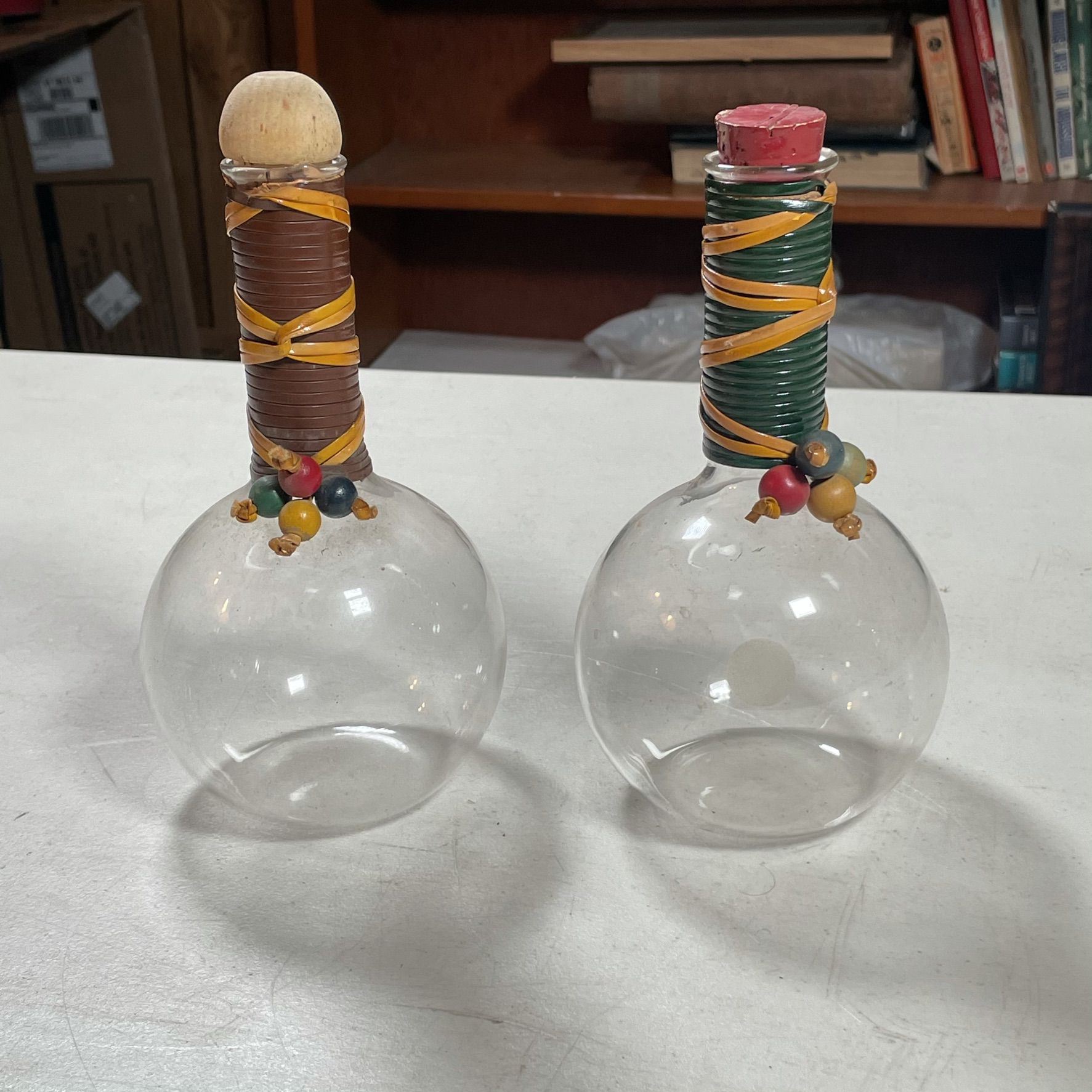 PAIR DECORATED PYREX BOTTLES